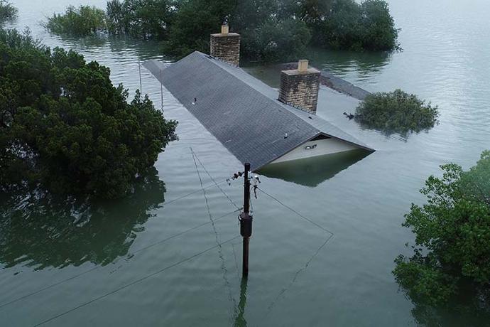 Aerial drone image of a flooded residence.