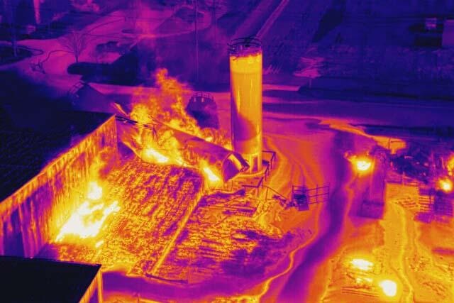 Aeria thermal drone image of active warehouse fire.