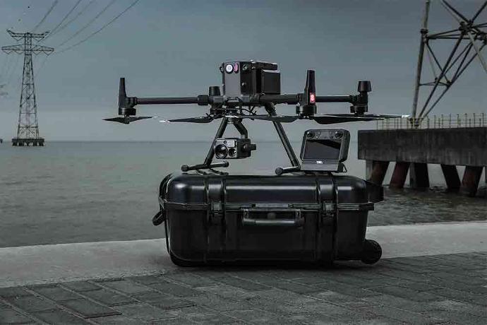 DJI M350 drone deployed on case with remote controller.